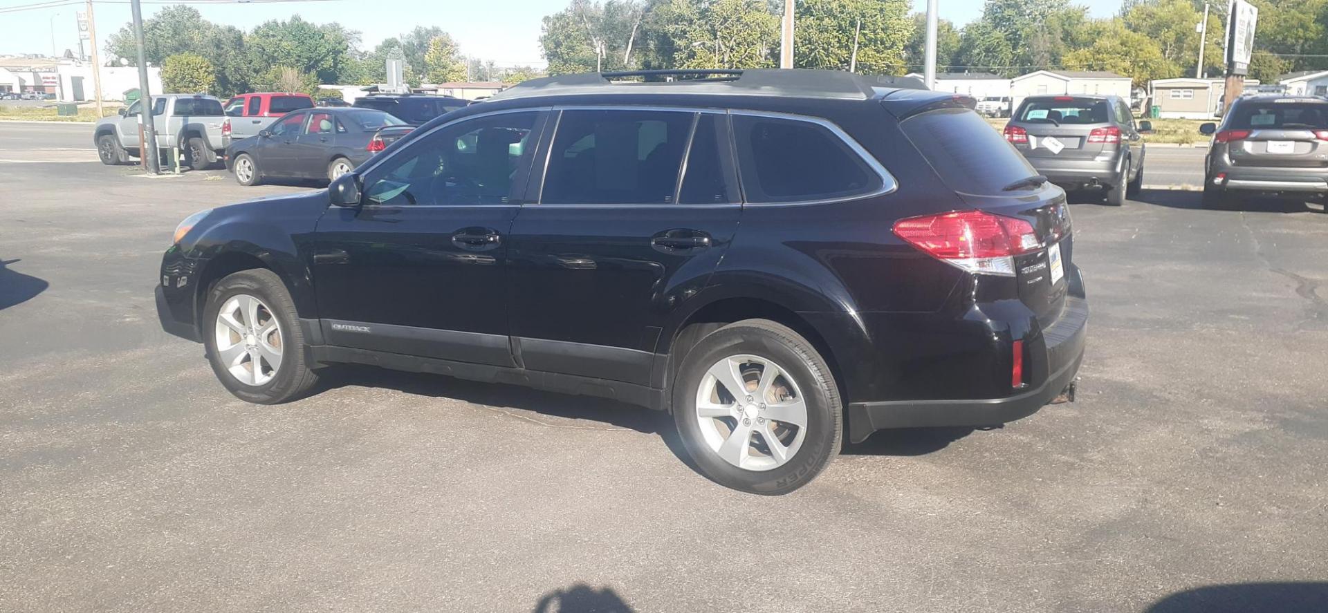 2014 Crystal Black Silica Subaru Outback 2.5i (4S4BRCAC1E3) with an 2.5L H4 DOHC 16V engine, located at 2015 Cambell Street, Rapid City, SD, 57701, (605) 342-8326, 44.066433, -103.191772 - CARFAX AVAILABLE - Photo#2