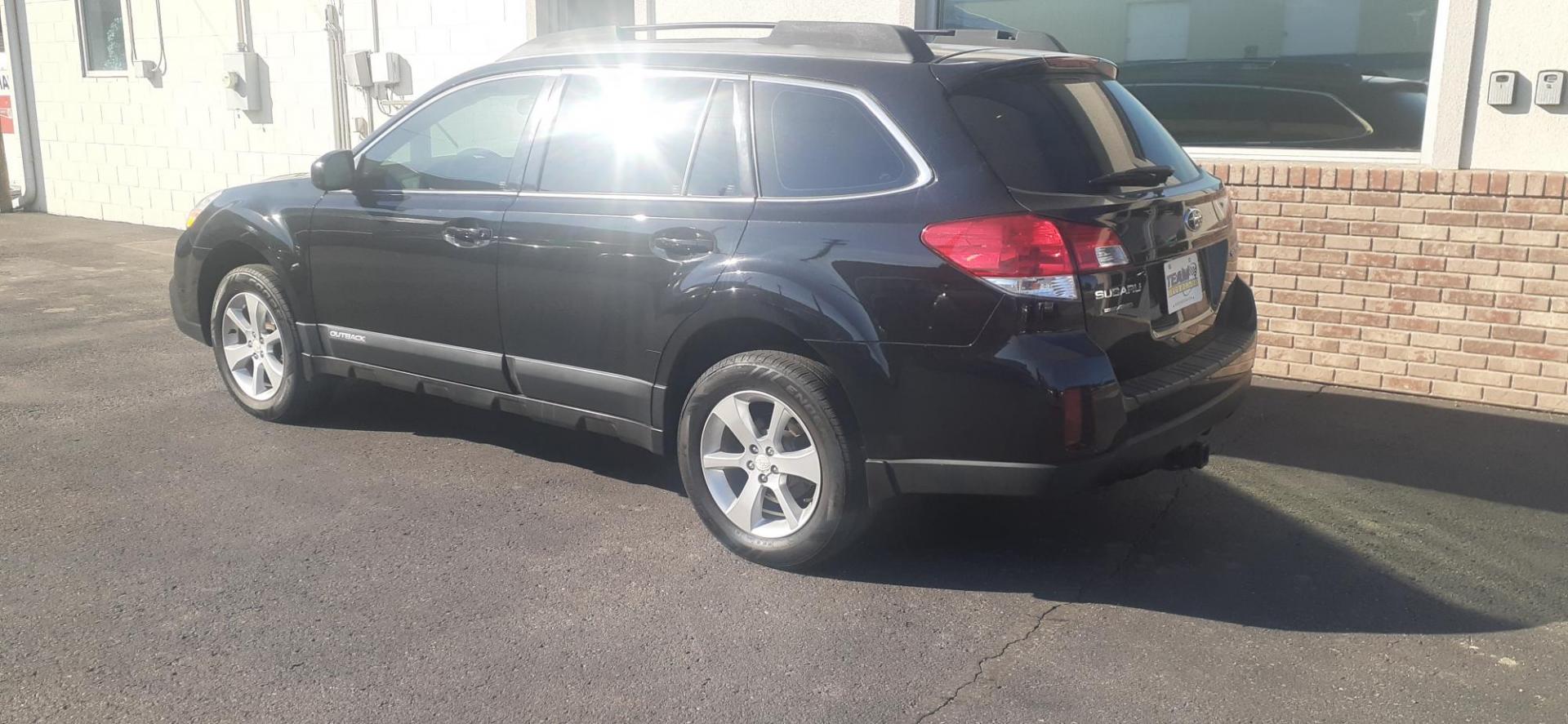 2014 Crystal Black Silica Subaru Outback 2.5i (4S4BRCAC1E3) with an 2.5L H4 DOHC 16V engine, located at 2015 Cambell Street, Rapid City, SD, 57701, (605) 342-8326, 44.066433, -103.191772 - CARFAX AVAILABLE - Photo#4