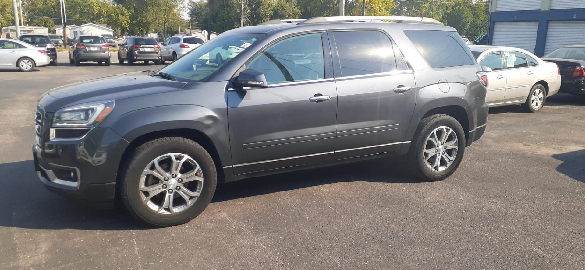 2014 GMC Acadia SLT-2 AWD (1GKKVSKD3EJ) with an 3.6L V6 DOHC 24V engine, 6-Speed Automatic transmission, located at 2015 Cambell Street, Rapid City, SD, 57701, (605) 342-8326, 44.066433, -103.191772 - Photo#0