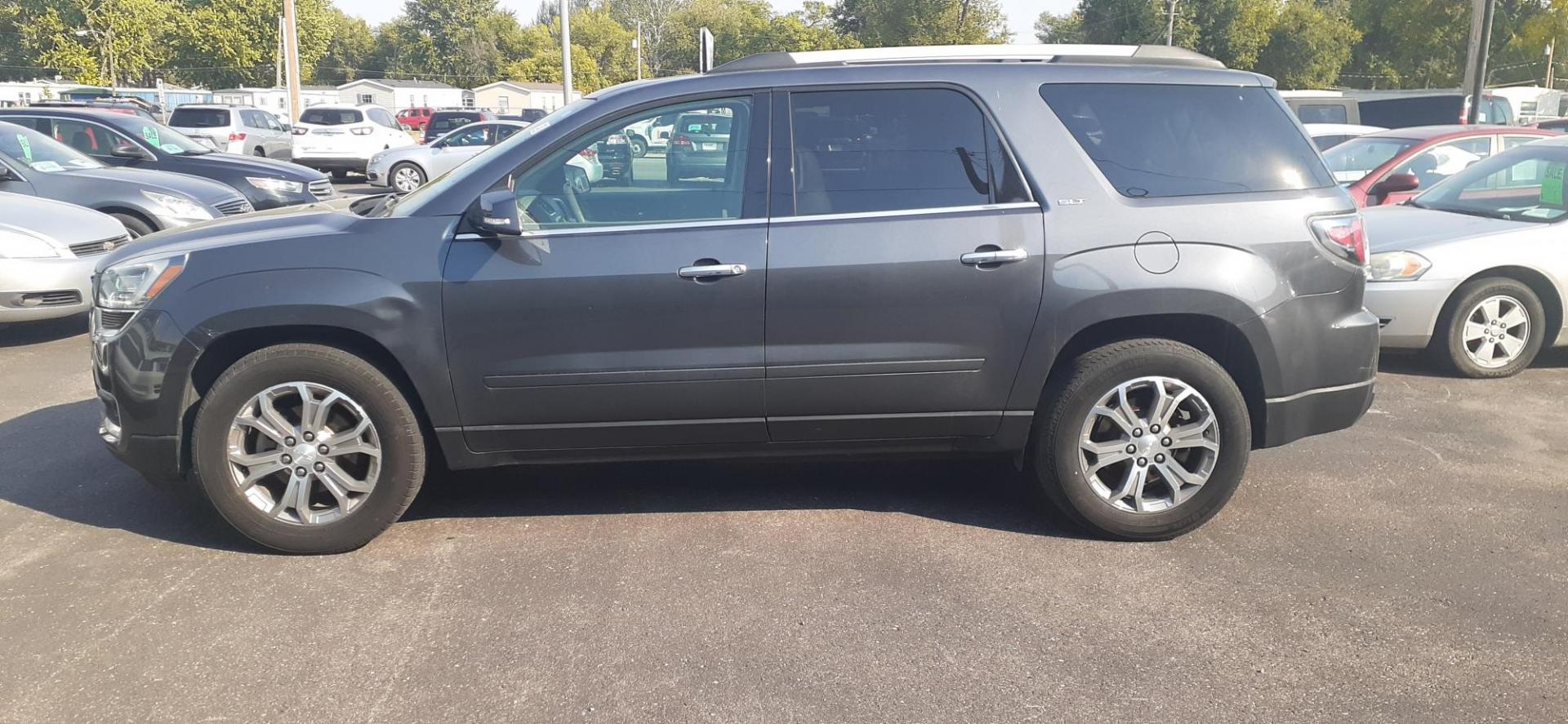 2014 GMC Acadia SLT-2 AWD (1GKKVSKD3EJ) with an 3.6L V6 DOHC 24V engine, 6-Speed Automatic transmission, located at 2015 Cambell Street, Rapid City, SD, 57701, (605) 342-8326, 44.066433, -103.191772 - Photo#1