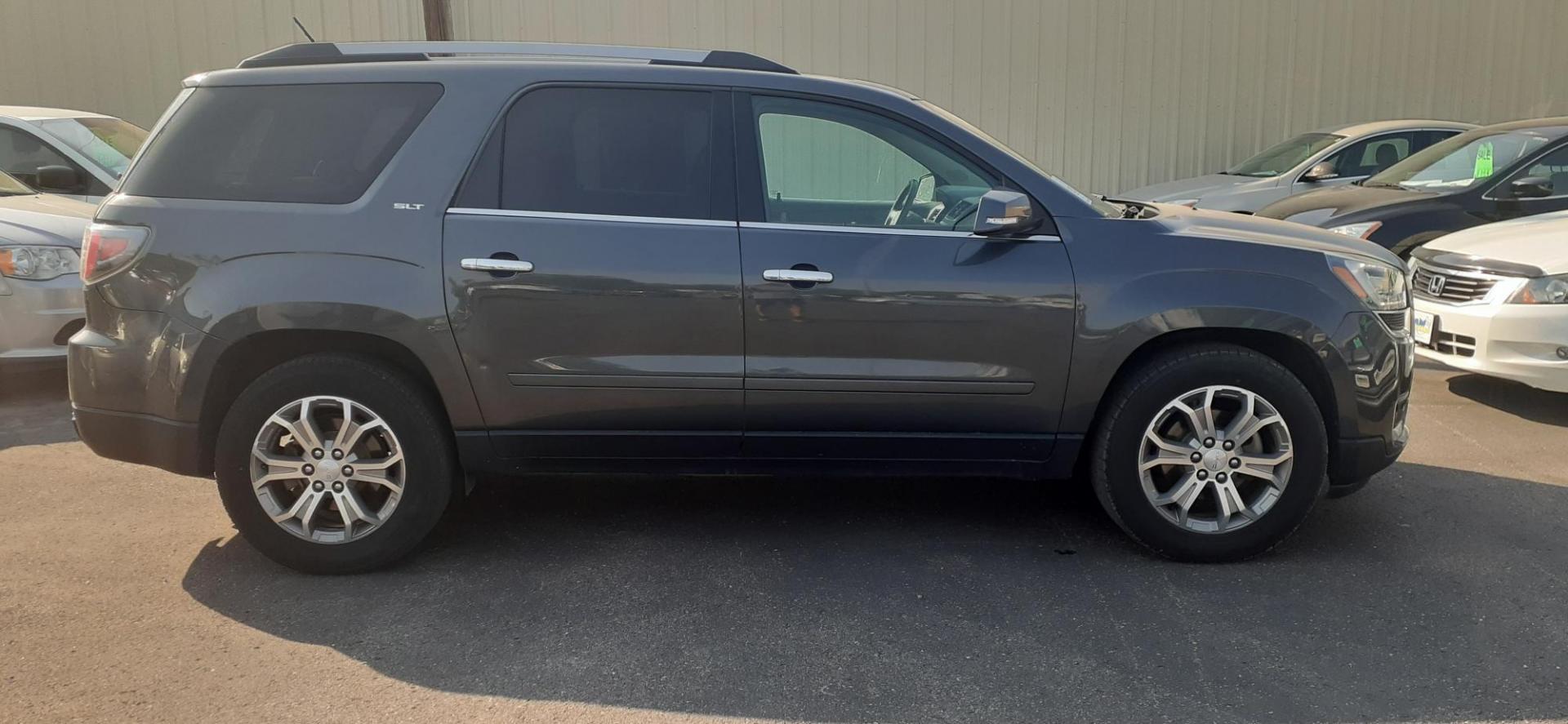 2014 GMC Acadia SLT-2 AWD (1GKKVSKD3EJ) with an 3.6L V6 DOHC 24V engine, 6-Speed Automatic transmission, located at 2015 Cambell Street, Rapid City, SD, 57701, (605) 342-8326, 44.066433, -103.191772 - Photo#5