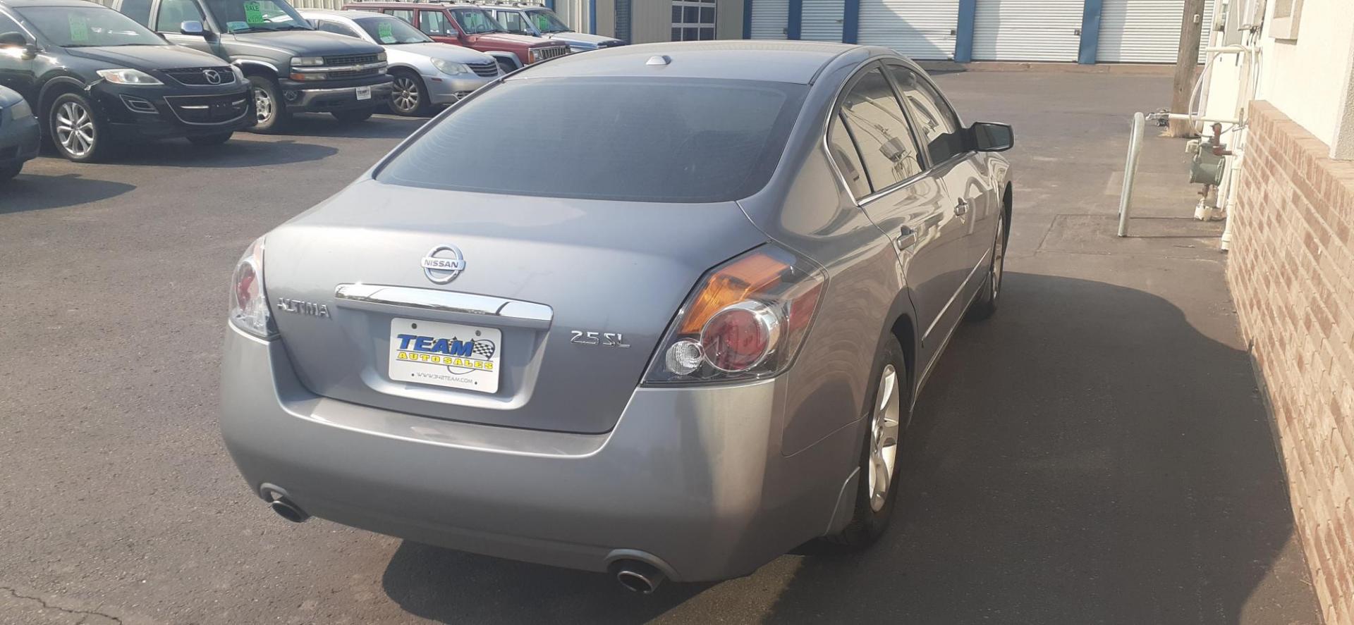 2009 Nissan Altima 2.5 (1N4AL21E49N) with an 2.5L L4 DOHC 16V engine, 6-Speed Manual Overdrive transmission, located at 2015 Cambell Street, Rapid City, SD, 57701, (605) 342-8326, 44.066433, -103.191772 - Photo#4