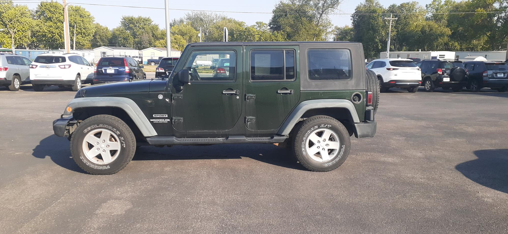 photo of 2011 Jeep Wrangler Unlimited Sport 4WD