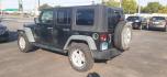 2011 Jeep Wrangler Unlimited Sport 4WD (1J4BA3H13BL) with an 3.8L V6 OHV 12V engine, located at 2015 Cambell Street, Rapid City, SD, 57701, (605) 342-8326, 44.066433, -103.191772 - CARFAX AVAILABLE - Photo#2