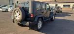 2011 Jeep Wrangler Unlimited Sport 4WD (1J4BA3H13BL) with an 3.8L V6 OHV 12V engine, located at 2015 Cambell Street, Rapid City, SD, 57701, (605) 342-8326, 44.066433, -103.191772 - CARFAX AVAILABLE - Photo#4