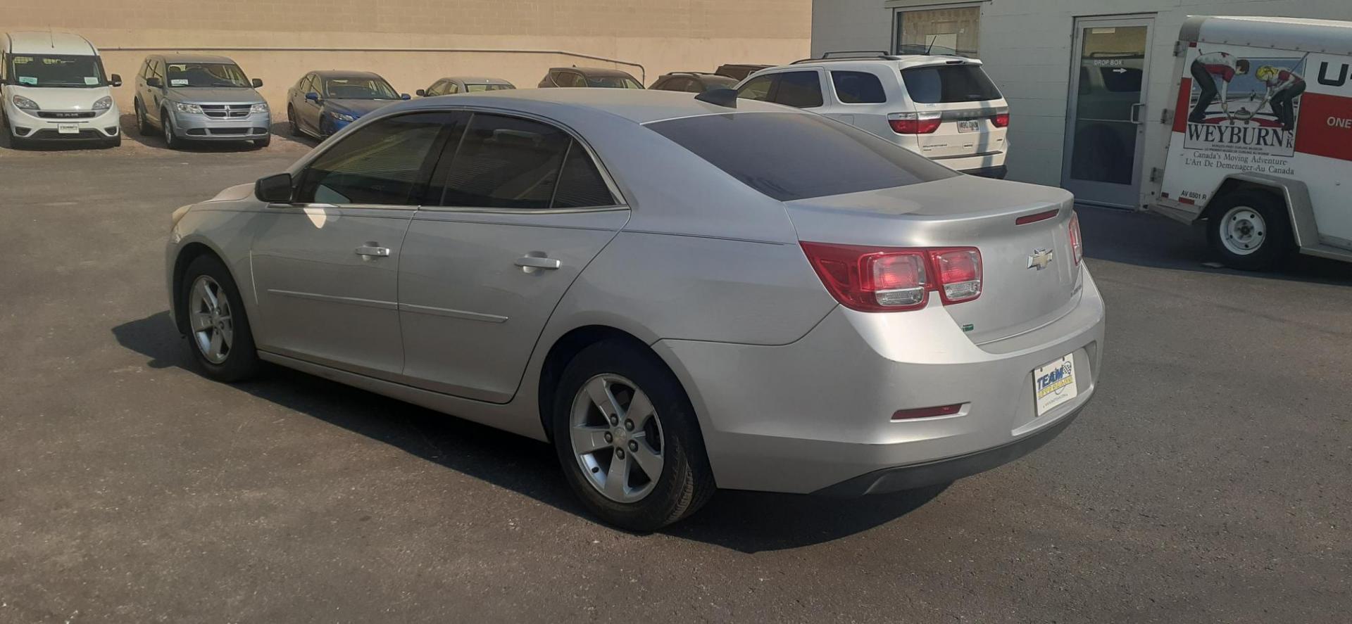 2015 Chevrolet Malibu LS (1G11B5SL9FF) with an 2.5L L4 DOHC 16V engine, 6-Speed Automatic transmission, located at 2015 Cambell Street, Rapid City, SD, 57701, (605) 342-8326, 44.066433, -103.191772 - CARFAX AVAILABLE - Photo#2