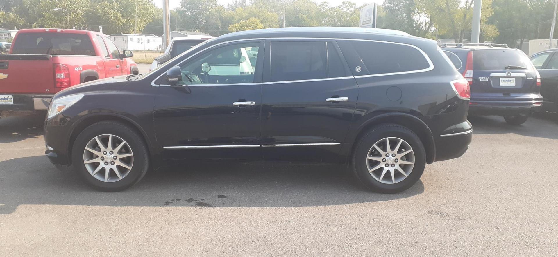 2017 Buick Enclave Leather AWD (5GAKVBKD5HJ) with an 3.6L V6 DOHC 24V engine, 6A transmission, located at 2015 Cambell Street, Rapid City, SD, 57701, (605) 342-8326, 44.066433, -103.191772 - CARFAX AVAILABLE - Photo#0