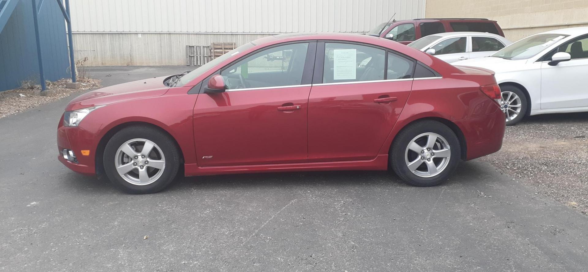 2013 Chevrolet Cruze 1LT Auto (1G1PC5SB6D7) with an 1.4L L4 DOHC 16V TURBO engine, 6-Speed Automatic transmission, located at 2015 Cambell Street, Rapid City, SD, 57701, (605) 342-8326, 44.066433, -103.191772 - CARFAX AVAILABLE - Photo#0