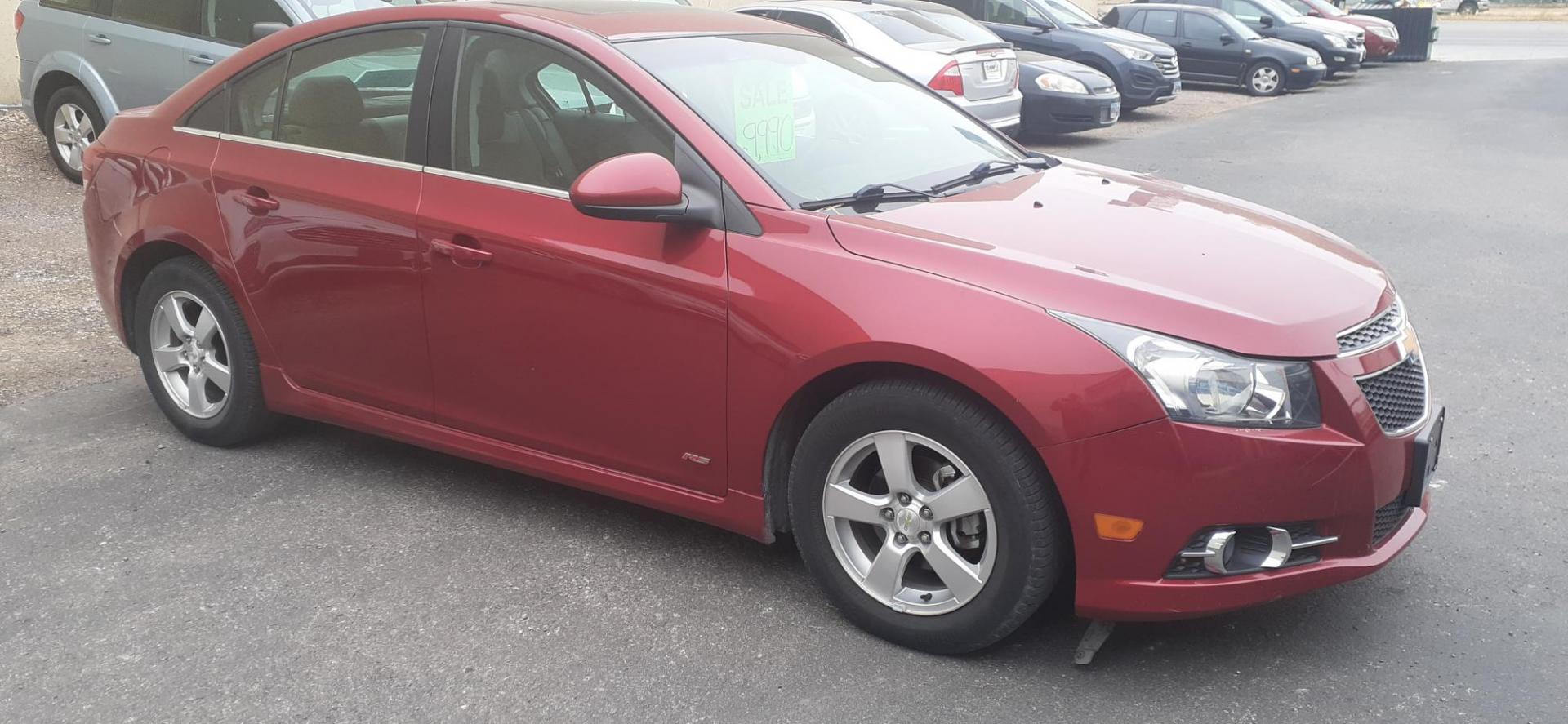 2013 Chevrolet Cruze 1LT Auto (1G1PC5SB6D7) with an 1.4L L4 DOHC 16V TURBO engine, 6-Speed Automatic transmission, located at 2015 Cambell Street, Rapid City, SD, 57701, (605) 342-8326, 44.066433, -103.191772 - CARFAX AVAILABLE - Photo#2