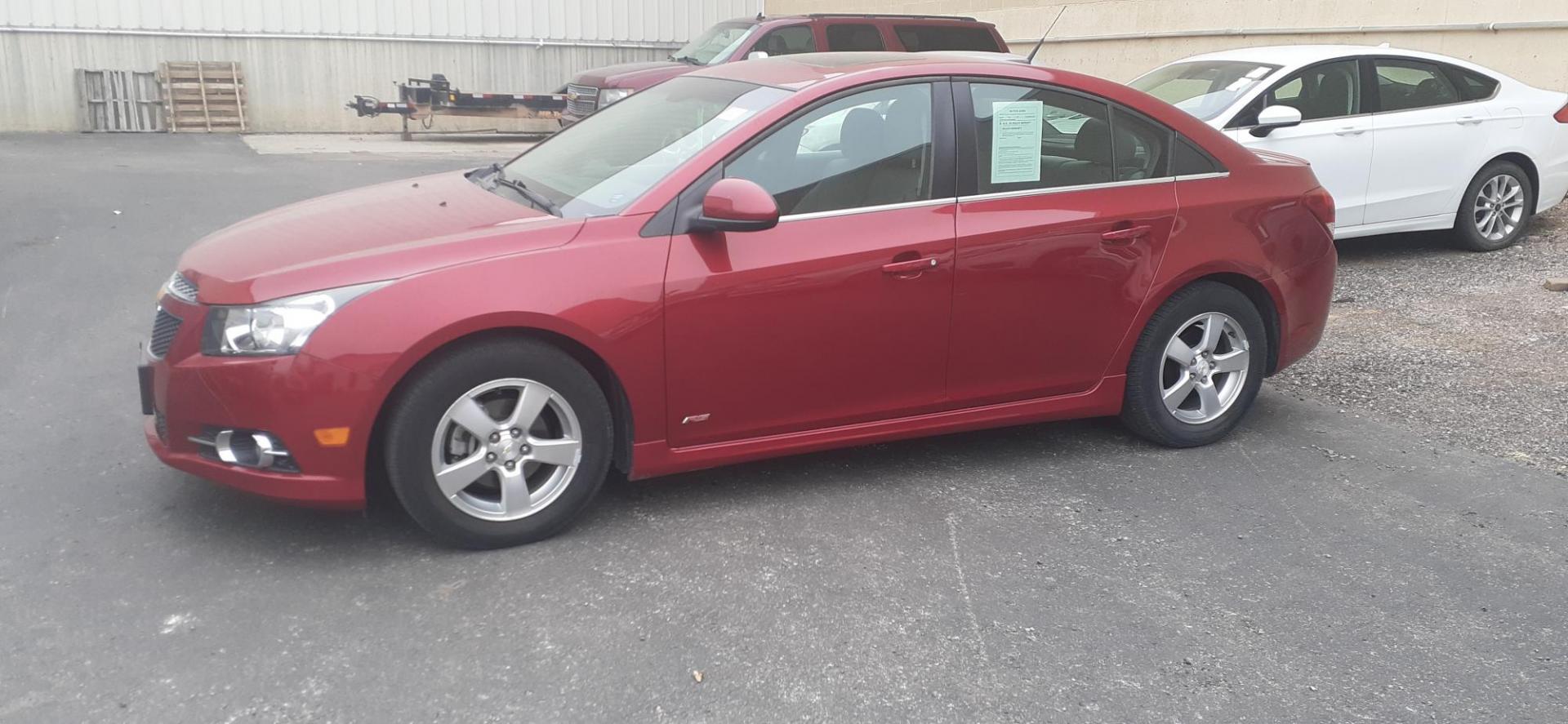 2013 Chevrolet Cruze 1LT Auto (1G1PC5SB6D7) with an 1.4L L4 DOHC 16V TURBO engine, 6-Speed Automatic transmission, located at 2015 Cambell Street, Rapid City, SD, 57701, (605) 342-8326, 44.066433, -103.191772 - CARFAX AVAILABLE - Photo#4