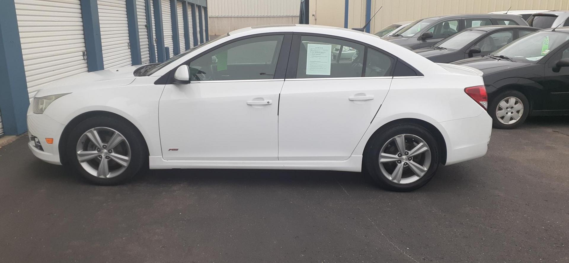 2012 Chevrolet Cruze 2LT (1G1PG5SCXC7) with an 1.4L L4 DOHC 16V TURBO engine, 6-Speed Automatic transmission, located at 2015 Cambell Street, Rapid City, SD, 57701, (605) 342-8326, 44.066433, -103.191772 - CARFAX AVAILABLE - Photo#0