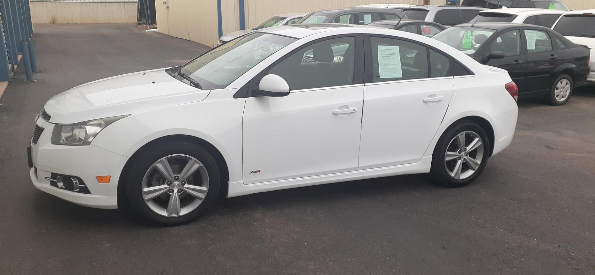 2012 Chevrolet Cruze 2LT (1G1PG5SCXC7) with an 1.4L L4 DOHC 16V TURBO engine, 6-Speed Automatic transmission, located at 2015 Cambell Street, Rapid City, SD, 57701, (605) 342-8326, 44.066433, -103.191772 - CARFAX AVAILABLE - Photo#1