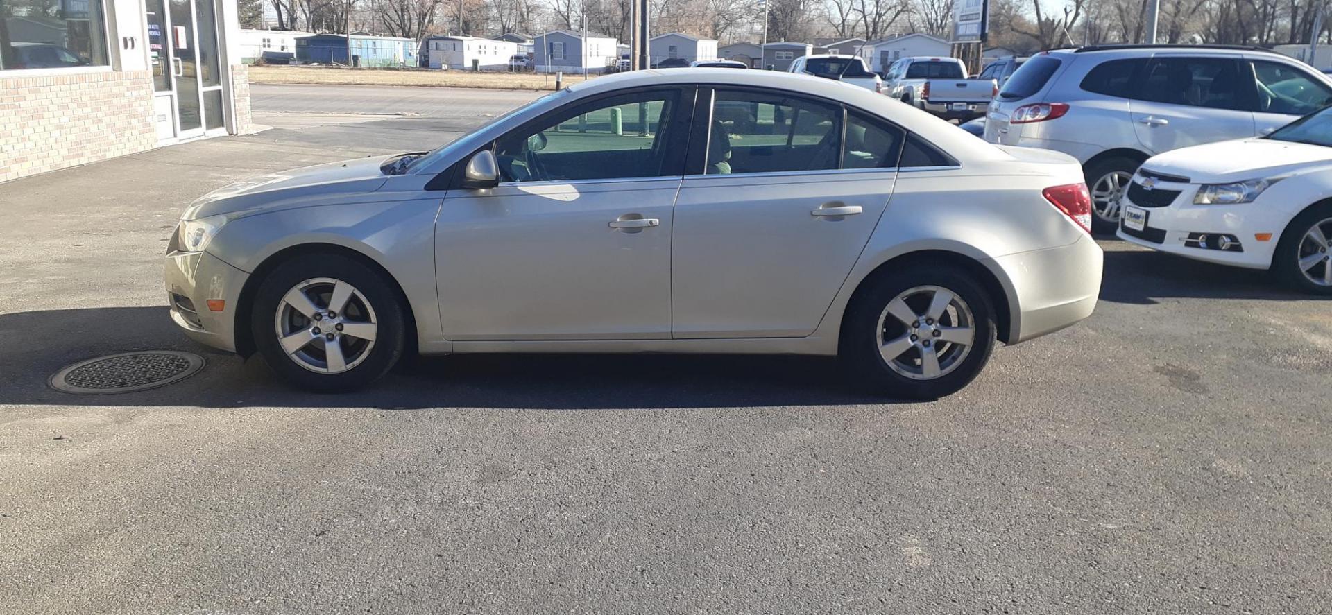 2013 Chevrolet Cruze 1LT Auto (1G1PC5SB6D7) with an 1.4L L4 DOHC 16V TURBO engine, 6-Speed Automatic transmission, located at 2015 Cambell Street, Rapid City, SD, 57701, (605) 342-8326, 44.066433, -103.191772 - Photo#2