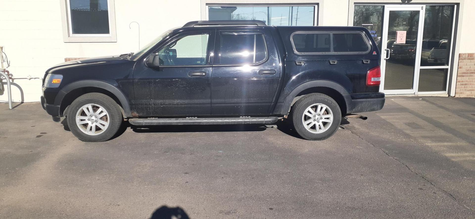 2009 Ford Explorer Sport Trac XLT 4.0L 4WD (1FMEU51E39U) with an 4.0L V6 SOHC 12V engine, 5-Speed Automatic transmission, located at 2015 Cambell Street, Rapid City, SD, 57701, (605) 342-8326, 44.066433, -103.191772 - CARFAX AVAILABLE - Photo#0