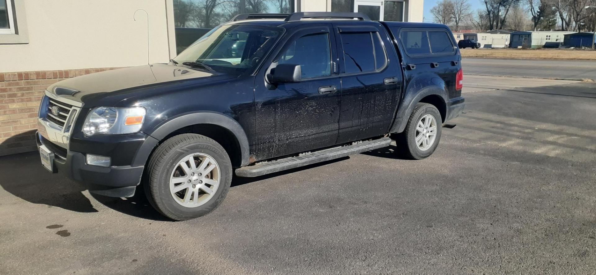 2009 Ford Explorer Sport Trac XLT 4.0L 4WD (1FMEU51E39U) with an 4.0L V6 SOHC 12V engine, 5-Speed Automatic transmission, located at 2015 Cambell Street, Rapid City, SD, 57701, (605) 342-8326, 44.066433, -103.191772 - CARFAX AVAILABLE - Photo#1