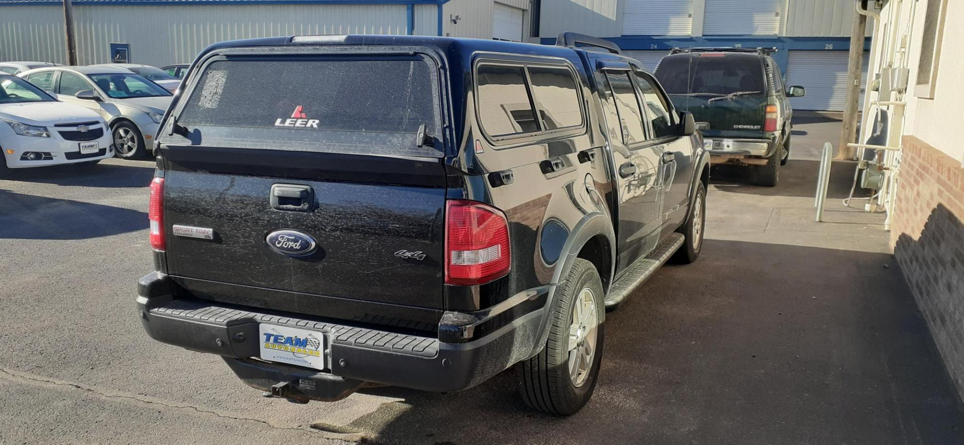 2009 Ford Explorer Sport Trac XLT 4.0L 4WD (1FMEU51E39U) with an 4.0L V6 SOHC 12V engine, 5-Speed Automatic transmission, located at 2015 Cambell Street, Rapid City, SD, 57701, (605) 342-8326, 44.066433, -103.191772 - CARFAX AVAILABLE - Photo#2