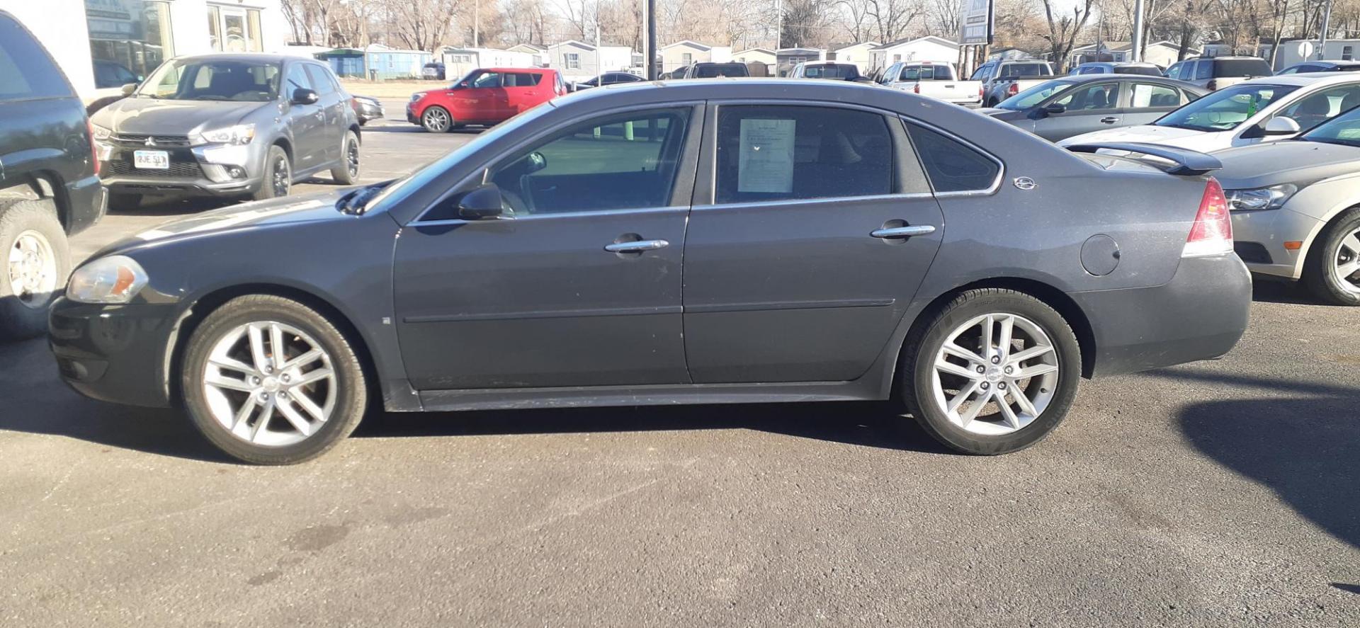 2009 Chevrolet Impala LTZ (2G1WU57M091) , 4-Speed Automatic Overdrive transmission, located at 2015 Cambell Street, Rapid City, SD, 57701, (605) 342-8326, 44.066433, -103.191772 - CARFAX AVAILABLE - Photo#0