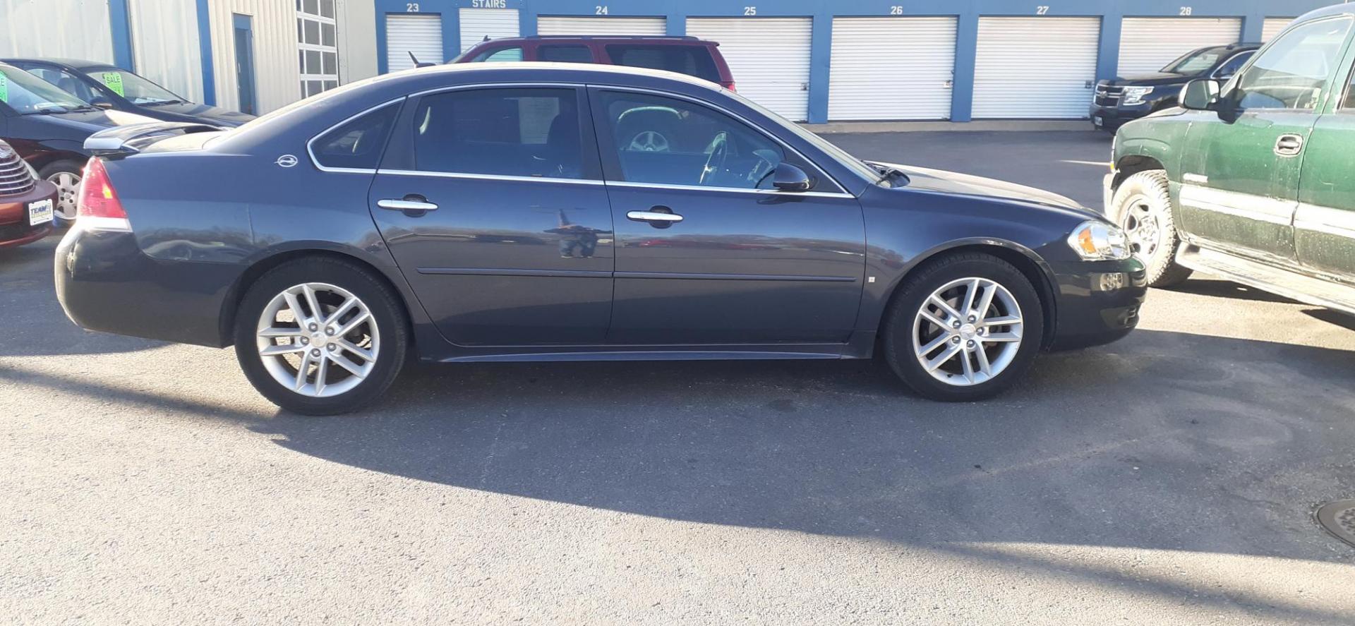 2009 Chevrolet Impala LTZ (2G1WU57M091) , 4-Speed Automatic Overdrive transmission, located at 2015 Cambell Street, Rapid City, SD, 57701, (605) 342-8326, 44.066433, -103.191772 - CARFAX AVAILABLE - Photo#4