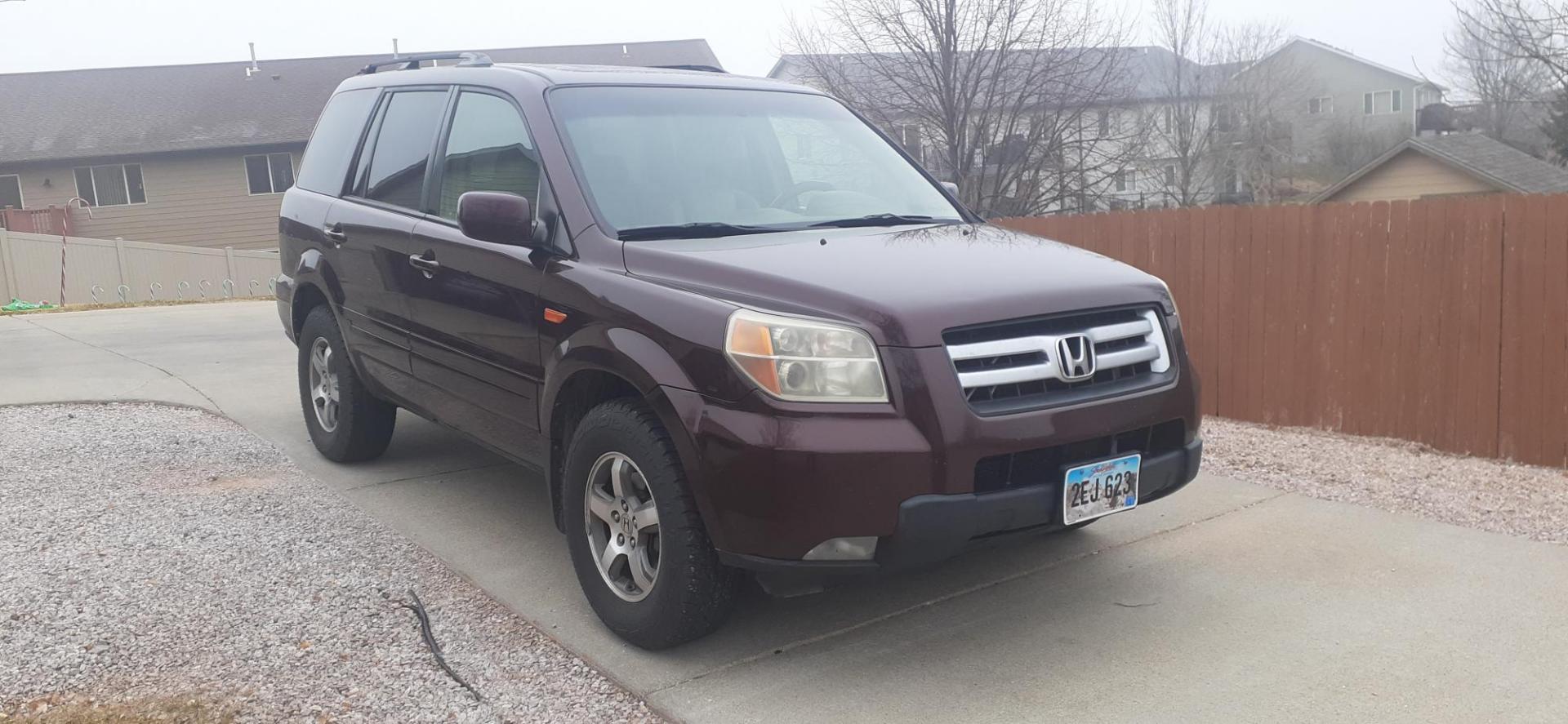 2008 Honda Pilot EX-L 4WD AT (5FNYF18588B) with an 3.5L V6 SOHC 24V engine, 5-Speed Automatic Overdrive transmission, located at 2015 Cambell Street, Rapid City, SD, 57701, (605) 342-8326, 44.066433, -103.191772 - CONSIGNMENT VEHICLE CARFAX AVAILABLE NEW TIRES AND BRAKES WATERPUMP AND TIMING BELT DONE AT 200,000 MILES $3600 WORTH OF MAINTENCE RECEIPTS HAVE QUESTIONS CALL OR TEXT JEFF 605-390-0478 MY PERSONAL VEHICLE - Photo#2