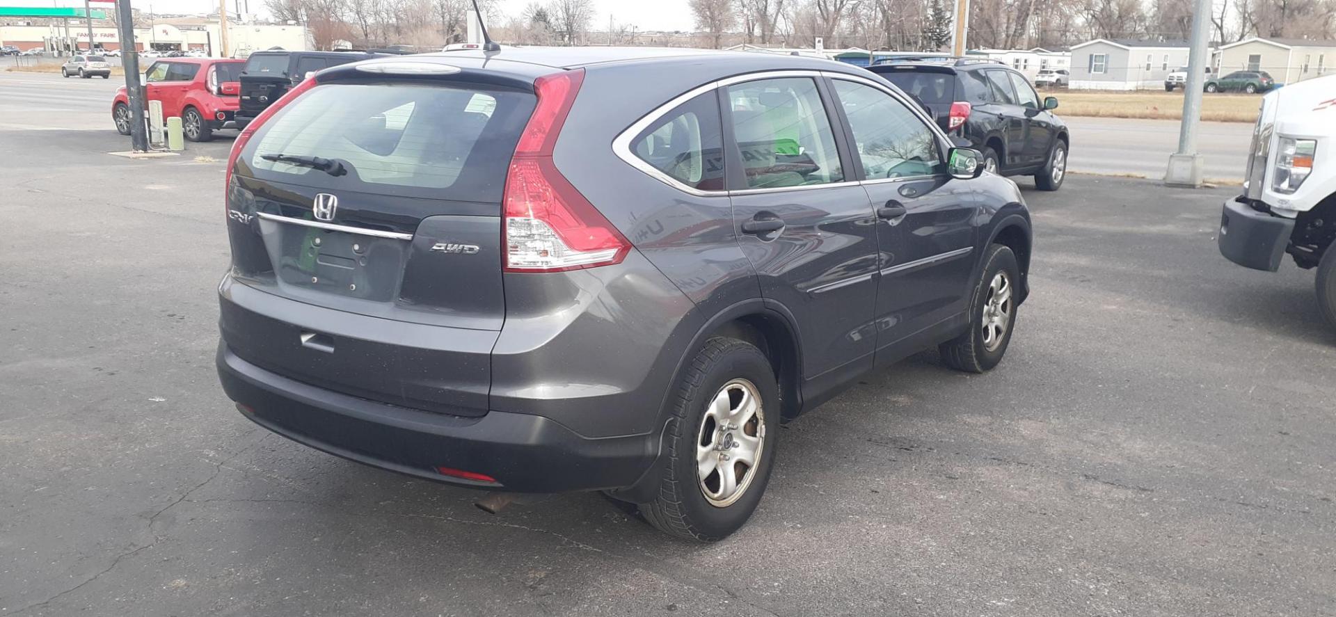 2012 Honda CR-V LX 4WD 5-Speed AT (5J6RM4H39CL) with an 2.4L L4 DOHC 16V engine, 5-Speed Automatic transmission, located at 2015 Cambell Street, Rapid City, SD, 57701, (605) 342-8326, 44.066433, -103.191772 - CARFAX AVAILABLE - Photo#4