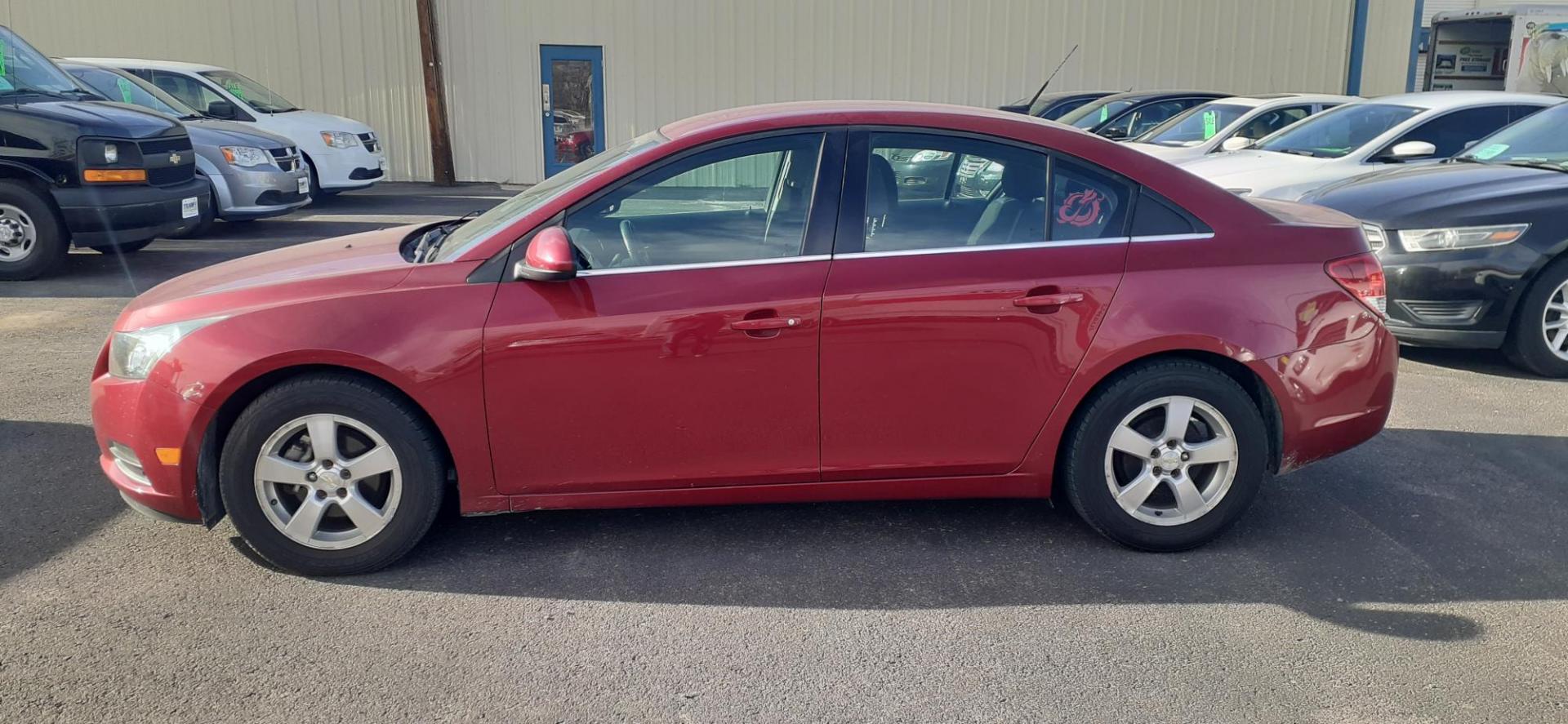 2014 Chevrolet Cruze 1LT Auto (1G1PC5SB8E7) with an 1.4L L4 DOHC 16V TURBO engine, 6-Speed Automatic transmission, located at 2015 Cambell Street, Rapid City, SD, 57701, (605) 342-8326, 44.066433, -103.191772 - CARFAX AVAILABLE - Photo#0