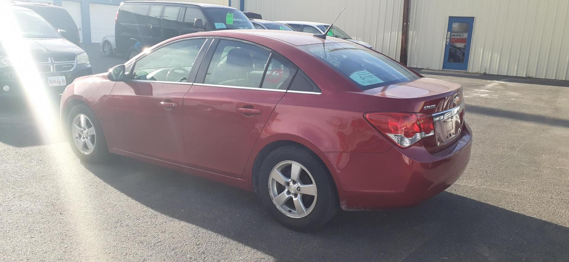 2014 Chevrolet Cruze 1LT Auto (1G1PC5SB8E7) with an 1.4L L4 DOHC 16V TURBO engine, 6-Speed Automatic transmission, located at 2015 Cambell Street, Rapid City, SD, 57701, (605) 342-8326, 44.066433, -103.191772 - CARFAX AVAILABLE - Photo#4