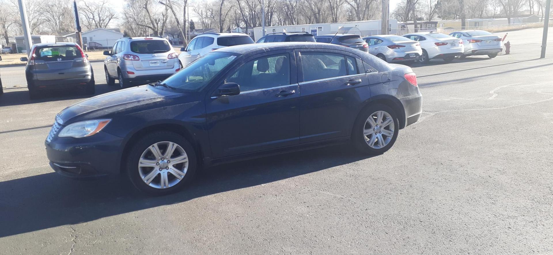 2013 Chrysler 200 Touring (1C3CCBBB1DN) with an 2.4L L4 DOHC 16V engine, 6-Speed Automatic transmission, located at 2015 Cambell Street, Rapid City, SD, 57701, (605) 342-8326, 44.066433, -103.191772 - CARFAX AVAILABLE - Photo#1