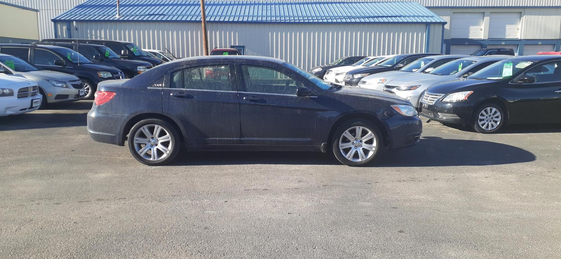 2013 Chrysler 200 Touring (1C3CCBBB1DN) with an 2.4L L4 DOHC 16V engine, 6-Speed Automatic transmission, located at 2015 Cambell Street, Rapid City, SD, 57701, (605) 342-8326, 44.066433, -103.191772 - CARFAX AVAILABLE - Photo#3