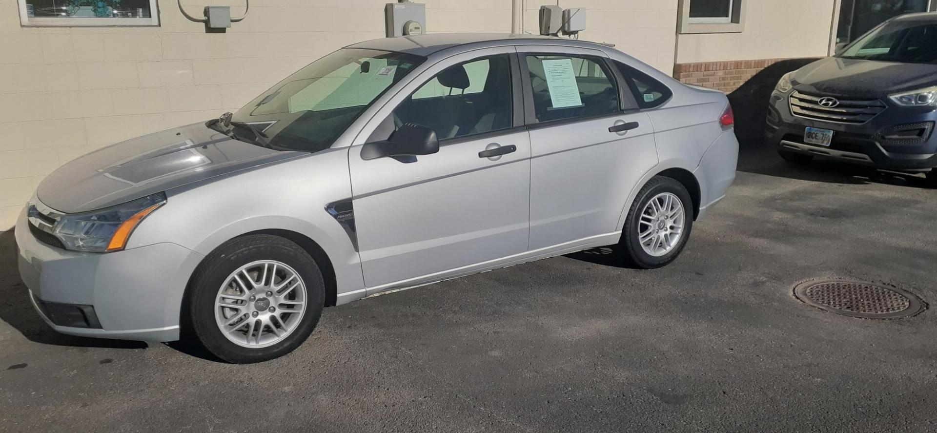 2008 Ford Focus SES Sedan (1FAHP35N08W) with an 2.0L L4 DOHC 16V engine, located at 2015 Cambell Street, Rapid City, SD, 57701, (605) 342-8326, 44.066433, -103.191772 - CARFAX AVAILABLE - Photo#1