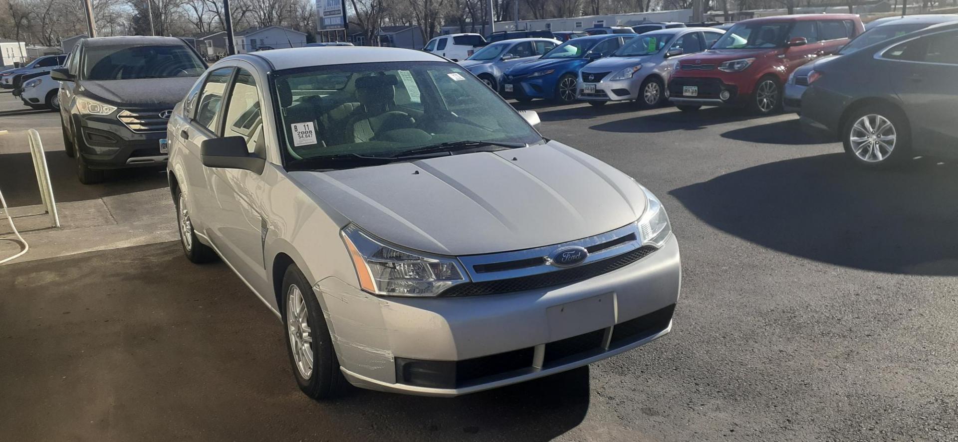 2008 Ford Focus SES Sedan (1FAHP35N08W) with an 2.0L L4 DOHC 16V engine, located at 2015 Cambell Street, Rapid City, SD, 57701, (605) 342-8326, 44.066433, -103.191772 - CARFAX AVAILABLE - Photo#5