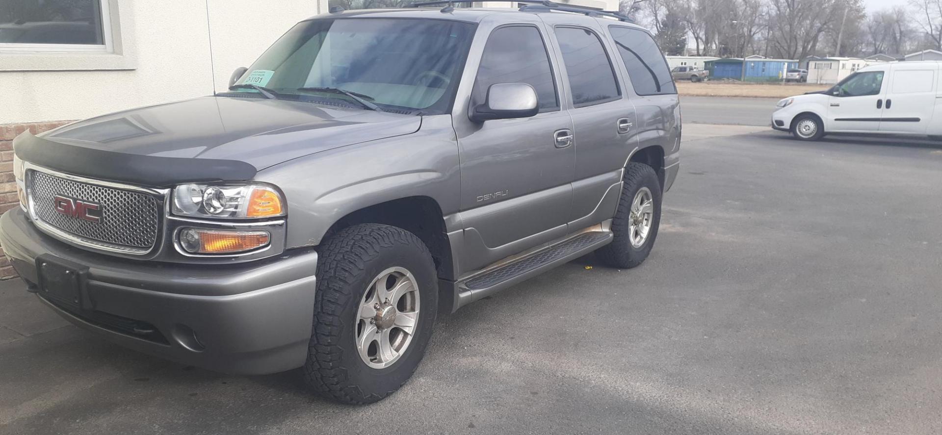 2005 GMC Yukon Denali Base (1GKEK63U95J) with an 6.0L V8 OHV 16V engine, 4-Speed Automatic Overdrive transmission, located at 2015 Cambell Street, Rapid City, SD, 57701, (605) 342-8326, 44.066433, -103.191772 - CARFAX AVAILABLE - Photo#1