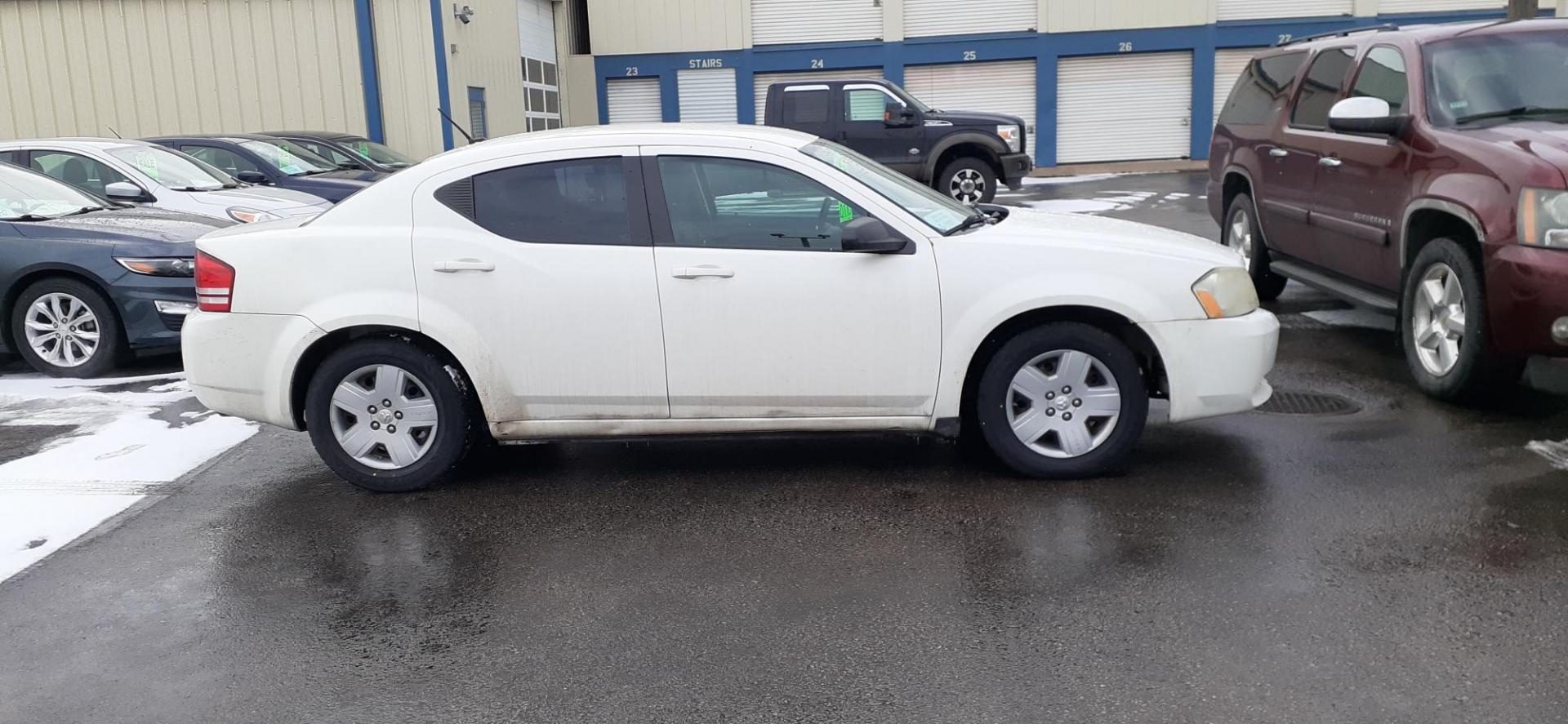 2010 Dodge Avenger SXT (1B3CC4FD0AN) with an 2.7L V6 DOHC 24V FFV engine, 4-Speed Automatic transmission, located at 2015 Cambell Street, Rapid City, SD, 57701, (605) 342-8326, 44.066433, -103.191772 - CARFAX AVAILABLE - Photo#3