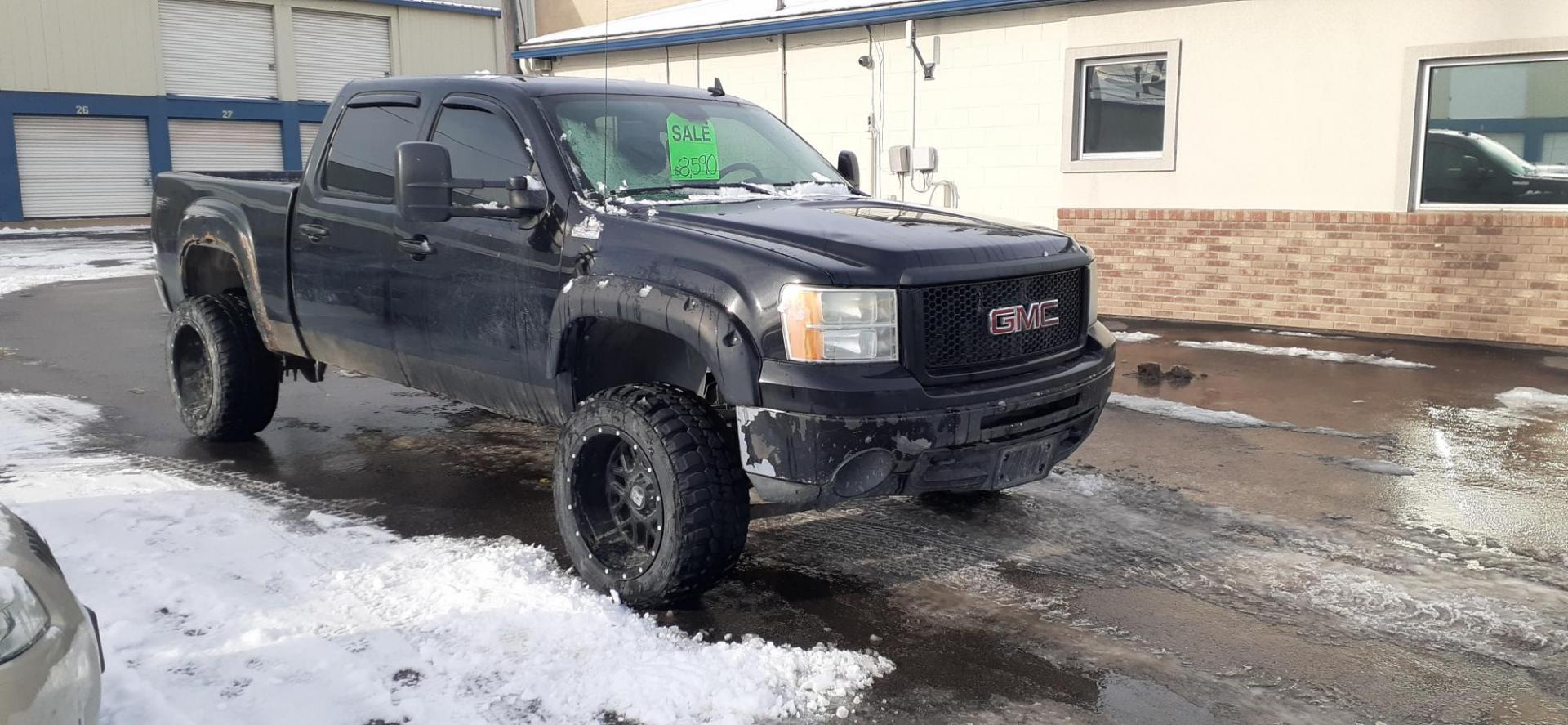 2009 GMC Sierra 1500 SLT Crew Cab 4WD (3GTEK33239G) with an 6.2L V8 OHV 16V engine, 4-Speed Automatic transmission, located at 2015 Cambell Street, Rapid City, SD, 57701, (605) 342-8326, 44.066433, -103.191772 - CARFAX AVAILABLE - Photo#3