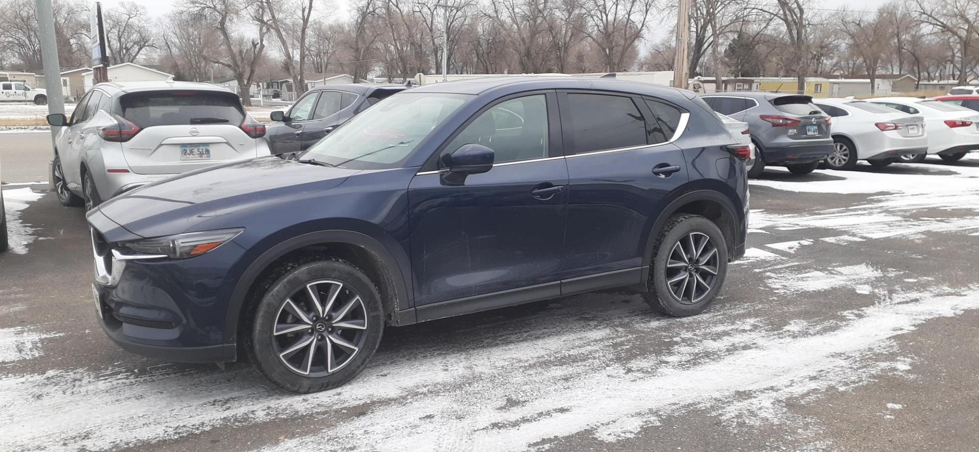 2018 Mazda CX-5 Grand Touring AWD (JM3KFBDM1J1) with an 2.5L L4 DOHC 16V engine, 6A transmission, located at 2015 Cambell Street, Rapid City, SD, 57701, (605) 342-8326, 44.066433, -103.191772 - CARFAX AVAILABLE - Photo#1