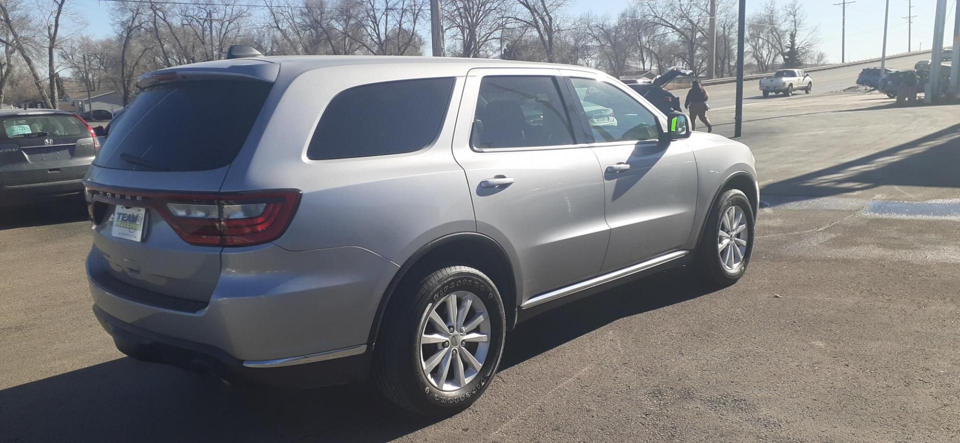 2015 Dodge Durango SXT AWD (1C4RDJAG3FC) with an 3.6L V6 DOHC 24V engine, 8-Speed Automatic transmission, located at 2015 Cambell Street, Rapid City, SD, 57701, (605) 342-8326, 44.066433, -103.191772 - CARFAX AVAILABLE - Photo#1