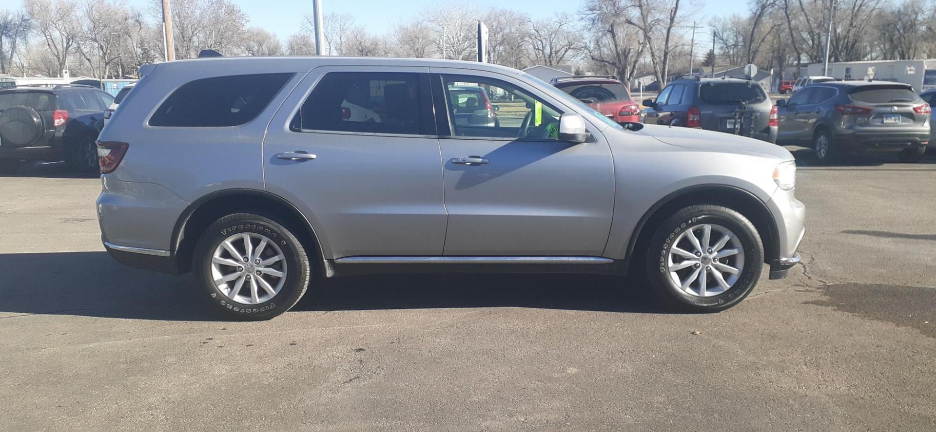 2015 Dodge Durango SXT AWD (1C4RDJAG3FC) with an 3.6L V6 DOHC 24V engine, 8-Speed Automatic transmission, located at 2015 Cambell Street, Rapid City, SD, 57701, (605) 342-8326, 44.066433, -103.191772 - CARFAX AVAILABLE - Photo#3