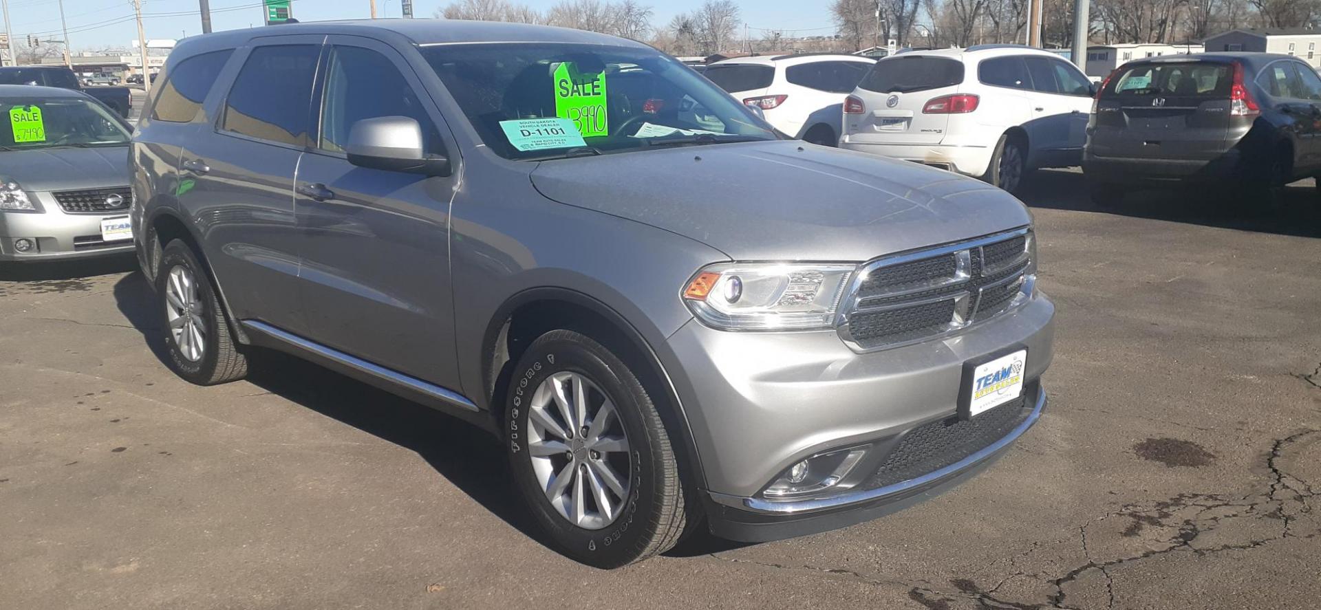 2015 Dodge Durango SXT AWD (1C4RDJAG3FC) with an 3.6L V6 DOHC 24V engine, 8-Speed Automatic transmission, located at 2015 Cambell Street, Rapid City, SD, 57701, (605) 342-8326, 44.066433, -103.191772 - CARFAX AVAILABLE - Photo#4