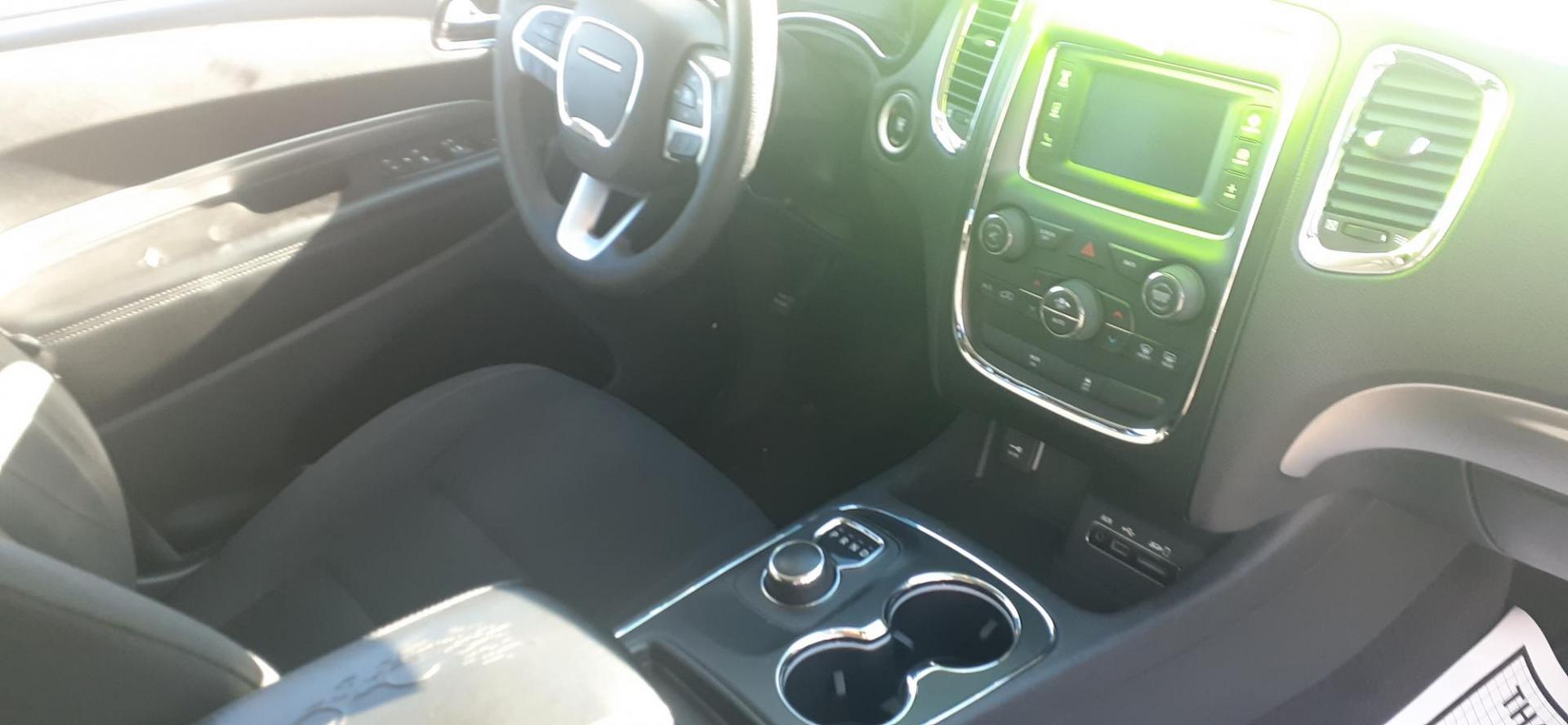 2015 Dodge Durango SXT AWD (1C4RDJAG3FC) with an 3.6L V6 DOHC 24V engine, 8-Speed Automatic transmission, located at 2015 Cambell Street, Rapid City, SD, 57701, (605) 342-8326, 44.066433, -103.191772 - CARFAX AVAILABLE - Photo#7