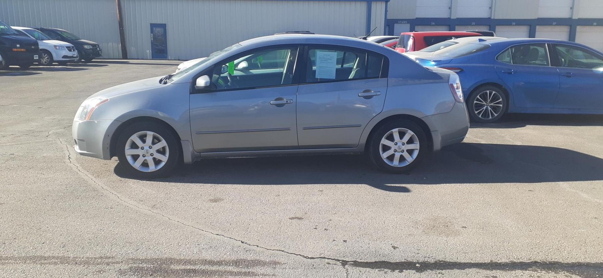 2009 Nissan Sentra 2.0 (3N1AB61E49L) with an 2.0L L4 DOHC 16V engine, CVT transmission, located at 2015 Cambell Street, Rapid City, SD, 57701, (605) 342-8326, 44.066433, -103.191772 - CARFAX AVAILABLE - Photo#0