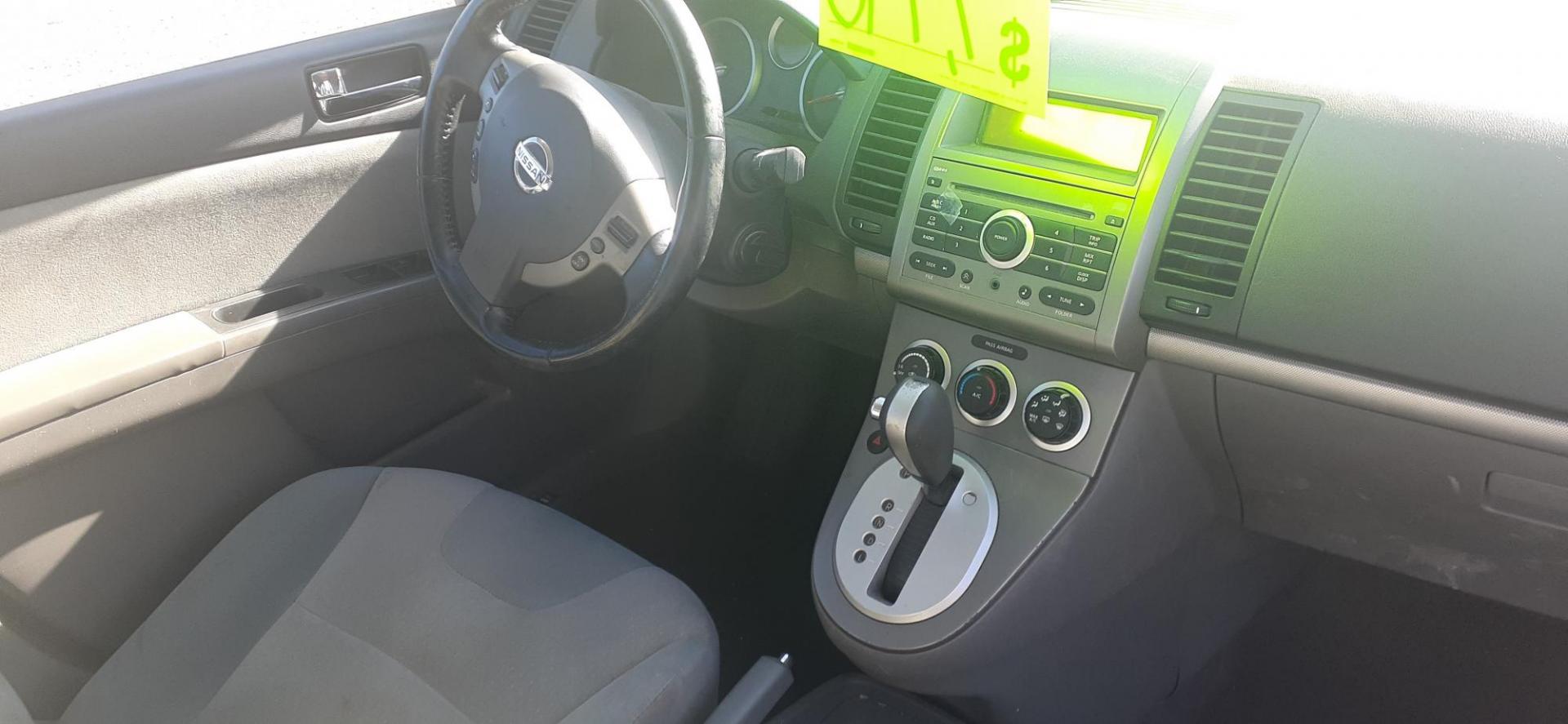 2009 Nissan Sentra 2.0 (3N1AB61E49L) with an 2.0L L4 DOHC 16V engine, CVT transmission, located at 2015 Cambell Street, Rapid City, SD, 57701, (605) 342-8326, 44.066433, -103.191772 - CARFAX AVAILABLE - Photo#5