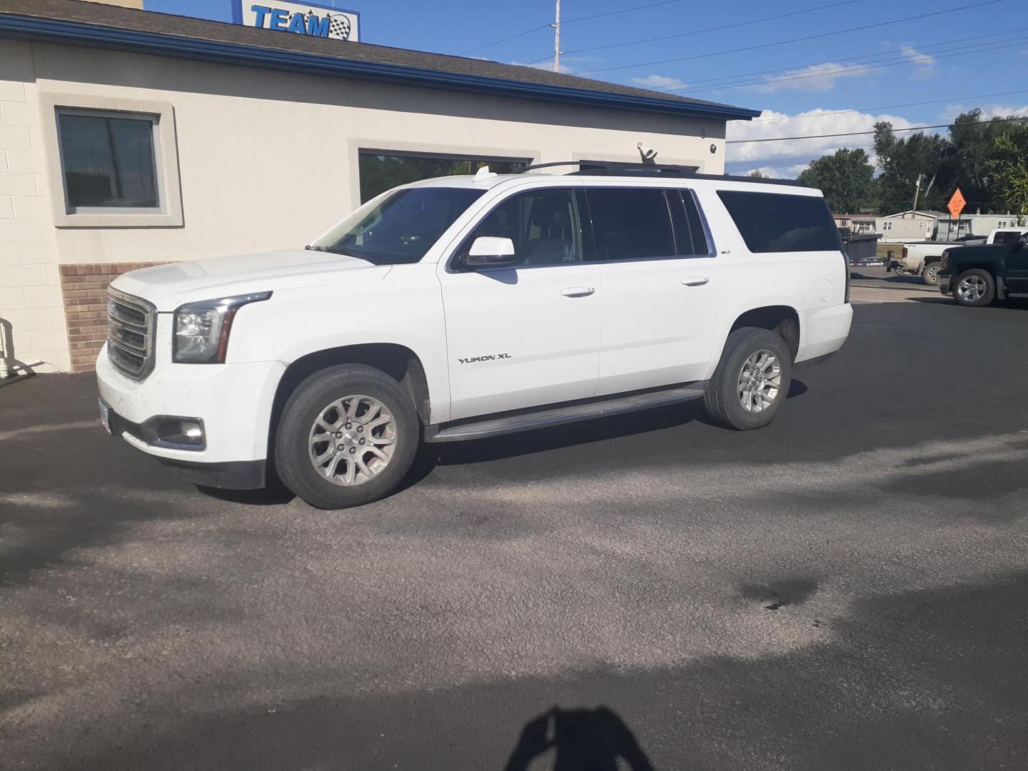 2019 GMC Yukon XL SLT 4WD (1GKS2GKC5KR) with an 5.3L V8 OHV 16V engine, 6A transmission, located at 2015 Cambell Street, Rapid City, SD, 57701, (605) 342-8326, 44.066433, -103.191772 - CARFAX AVAILABLE - Photo#1