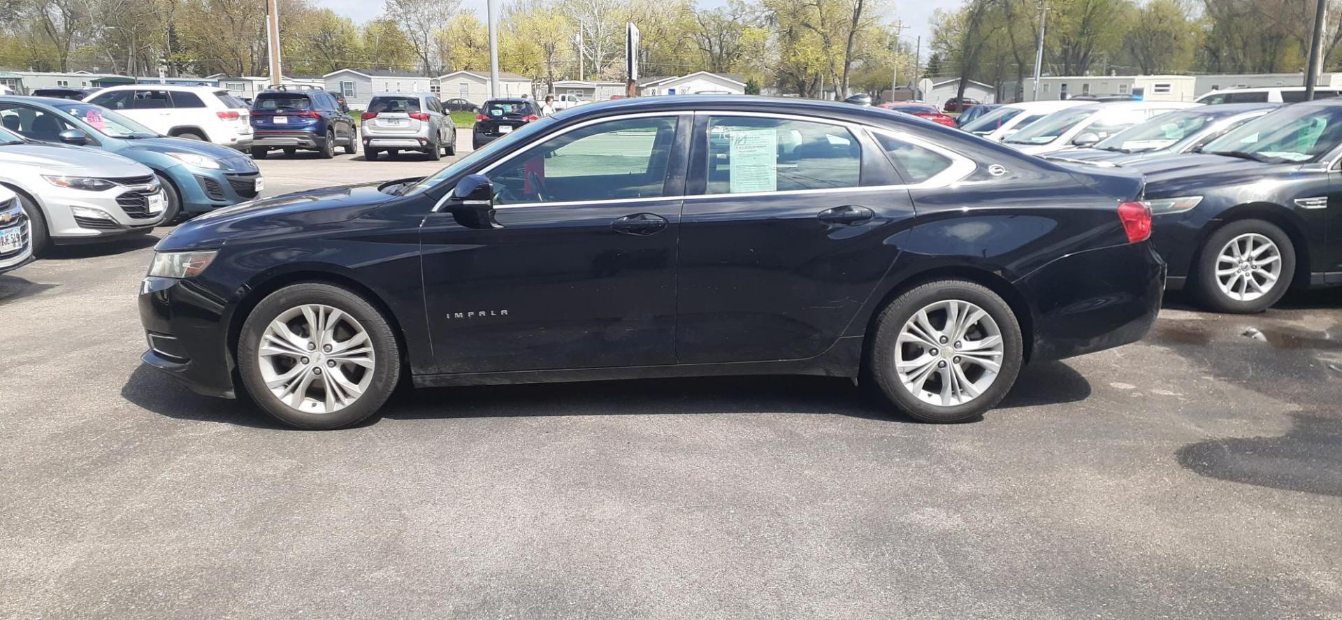 2014 Chevrolet Impala 1LT (2G1115SLXE9) with an 2.5L L4 DOHC 16V engine, 6-Speed Automatic transmission, located at 2015 Cambell Street, Rapid City, SD, 57701, (605) 342-8326, 44.066433, -103.191772 - CARFAX AVAILABLE - Photo#5