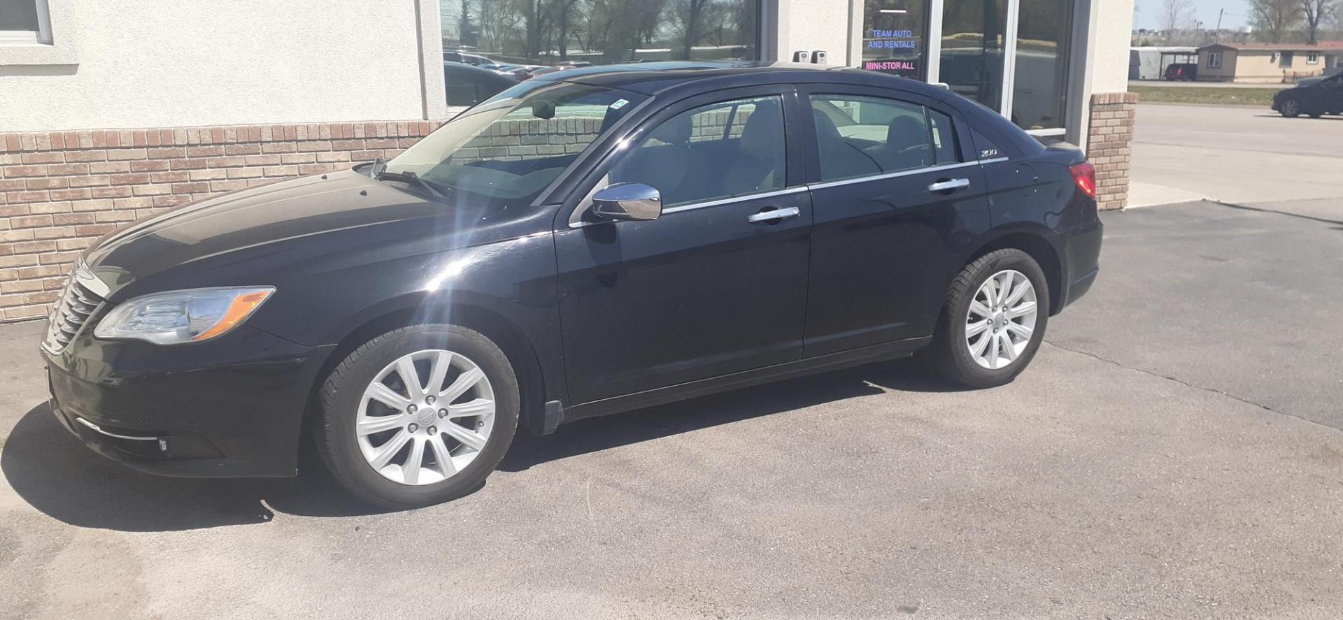 2014 Chrysler 200 Limited (1C3CCBCG5EN) with an 3.6L V6 DOHC 24V FFV engine, 6-Speed Automatic transmission, located at 2015 Cambell Street, Rapid City, SD, 57701, (605) 342-8326, 44.066433, -103.191772 - CARFAX AVAILABLE - Photo#1