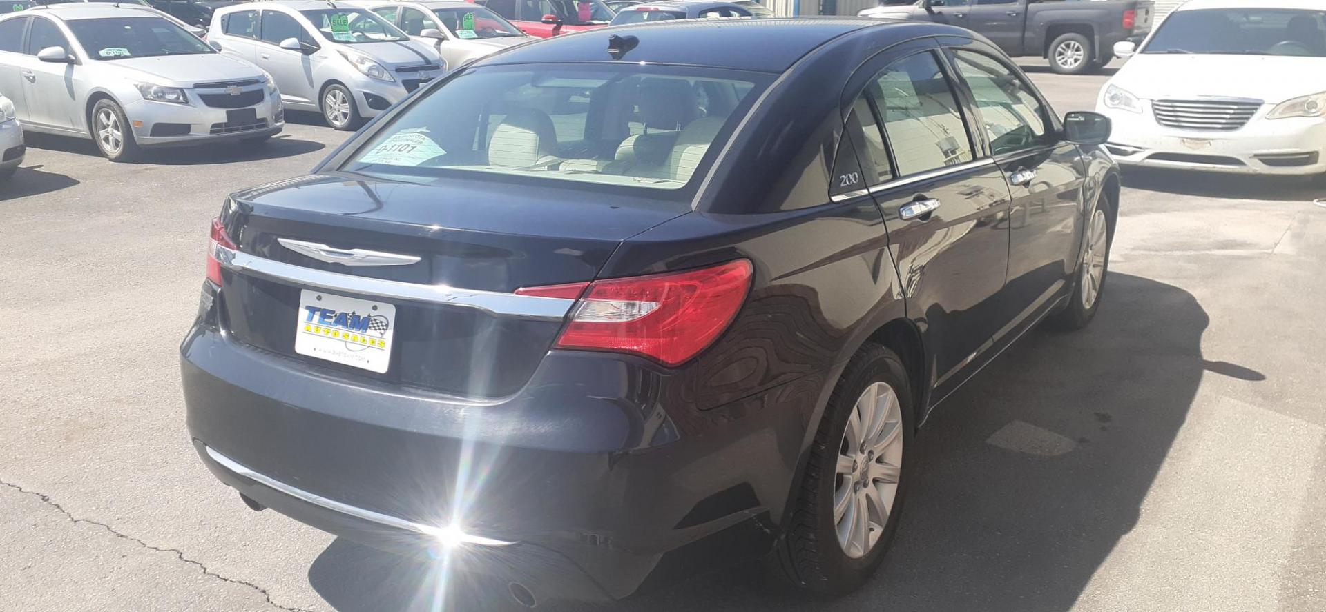 2014 Chrysler 200 Limited (1C3CCBCG5EN) with an 3.6L V6 DOHC 24V FFV engine, 6-Speed Automatic transmission, located at 2015 Cambell Street, Rapid City, SD, 57701, (605) 342-8326, 44.066433, -103.191772 - CARFAX AVAILABLE - Photo#2