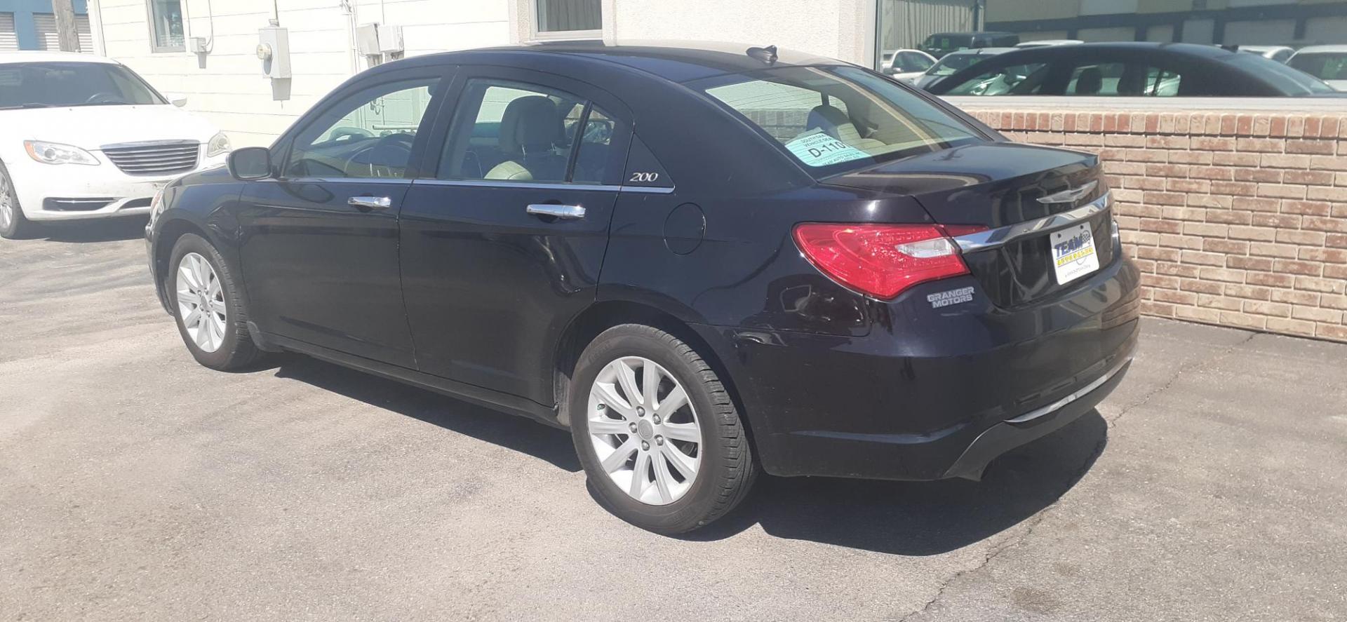 2014 Chrysler 200 Limited (1C3CCBCG5EN) with an 3.6L V6 DOHC 24V FFV engine, 6-Speed Automatic transmission, located at 2015 Cambell Street, Rapid City, SD, 57701, (605) 342-8326, 44.066433, -103.191772 - CARFAX AVAILABLE - Photo#4