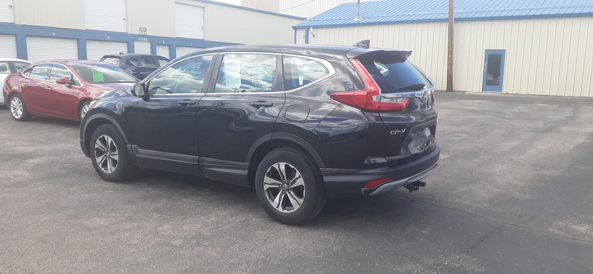 2018 Honda CR-V LX AWD (2HKRW6H36JH) with an 2.4L L4 DOHC 16V engine, CVT transmission, located at 2015 Cambell Street, Rapid City, SD, 57701, (605) 342-8326, 44.066433, -103.191772 - CARFAX AVAILABLE - Photo#2