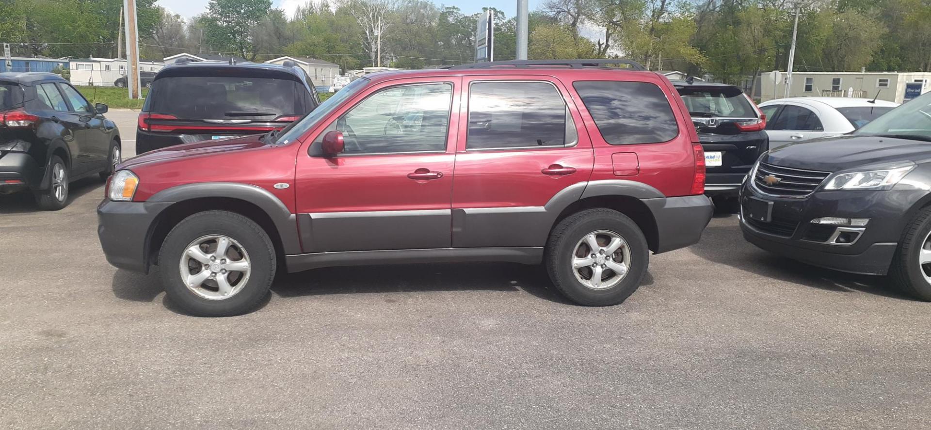 2006 Mazda Tribute s 4WD 4-spd AT (4F2CZ941X6K) with an 3.0L V6 DOHC 24V engine, 4-Speed Automatic transmission, located at 2015 Cambell Street, Rapid City, SD, 57701, (605) 342-8326, 44.066433, -103.191772 - CARFAX AVAILABLE - Photo#0