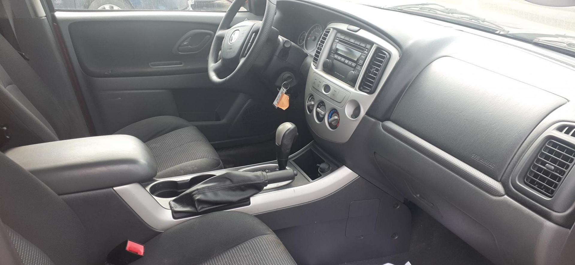 2006 Mazda Tribute s 4WD 4-spd AT (4F2CZ941X6K) with an 3.0L V6 DOHC 24V engine, 4-Speed Automatic transmission, located at 2015 Cambell Street, Rapid City, SD, 57701, (605) 342-8326, 44.066433, -103.191772 - CARFAX AVAILABLE - Photo#5