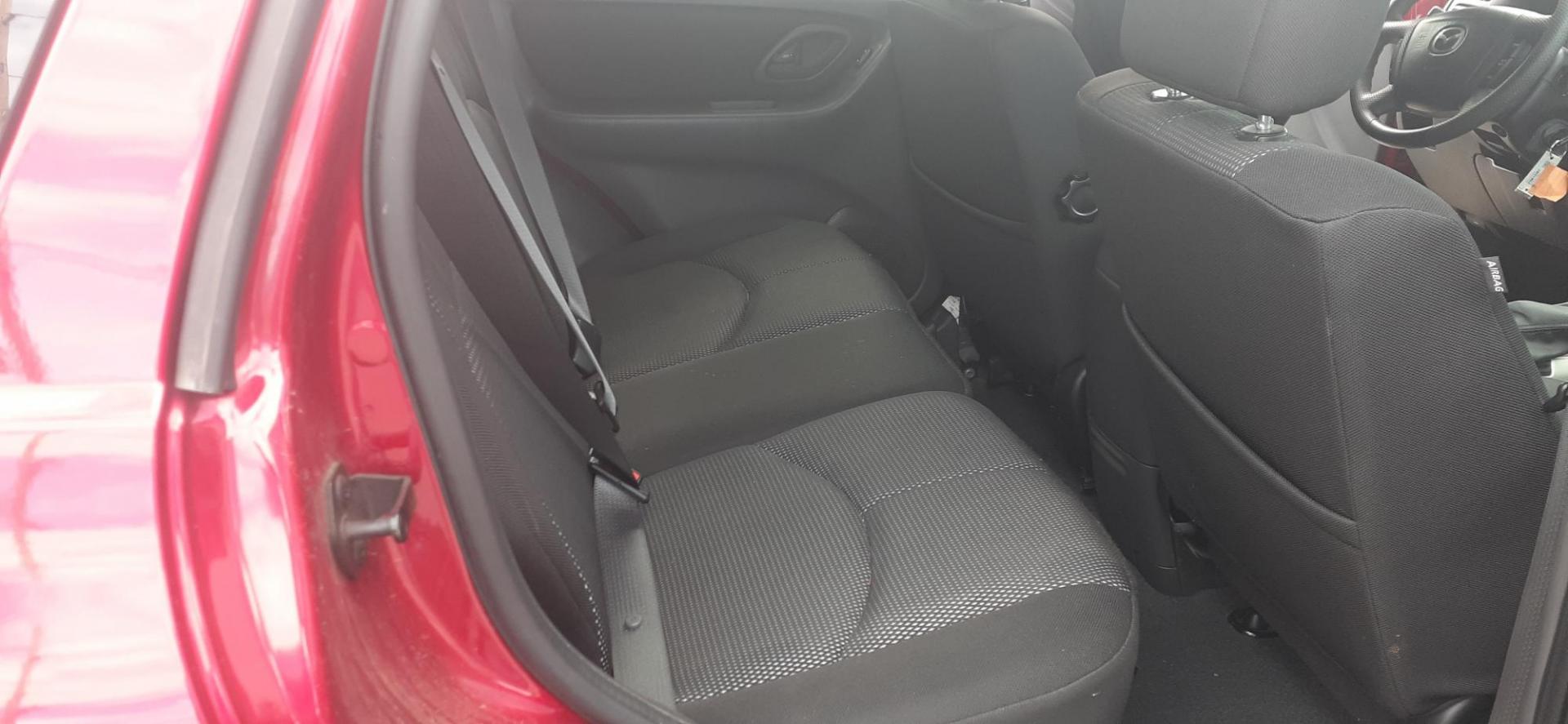2006 Mazda Tribute s 4WD 4-spd AT (4F2CZ941X6K) with an 3.0L V6 DOHC 24V engine, 4-Speed Automatic transmission, located at 2015 Cambell Street, Rapid City, SD, 57701, (605) 342-8326, 44.066433, -103.191772 - CARFAX AVAILABLE - Photo#6