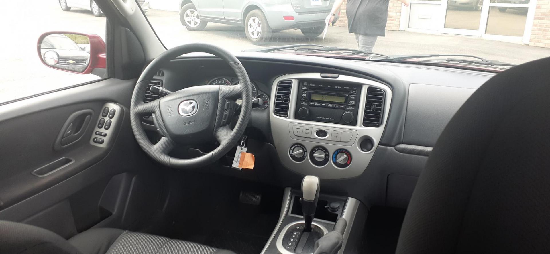 2006 Mazda Tribute s 4WD 4-spd AT (4F2CZ941X6K) with an 3.0L V6 DOHC 24V engine, 4-Speed Automatic transmission, located at 2015 Cambell Street, Rapid City, SD, 57701, (605) 342-8326, 44.066433, -103.191772 - CARFAX AVAILABLE - Photo#8